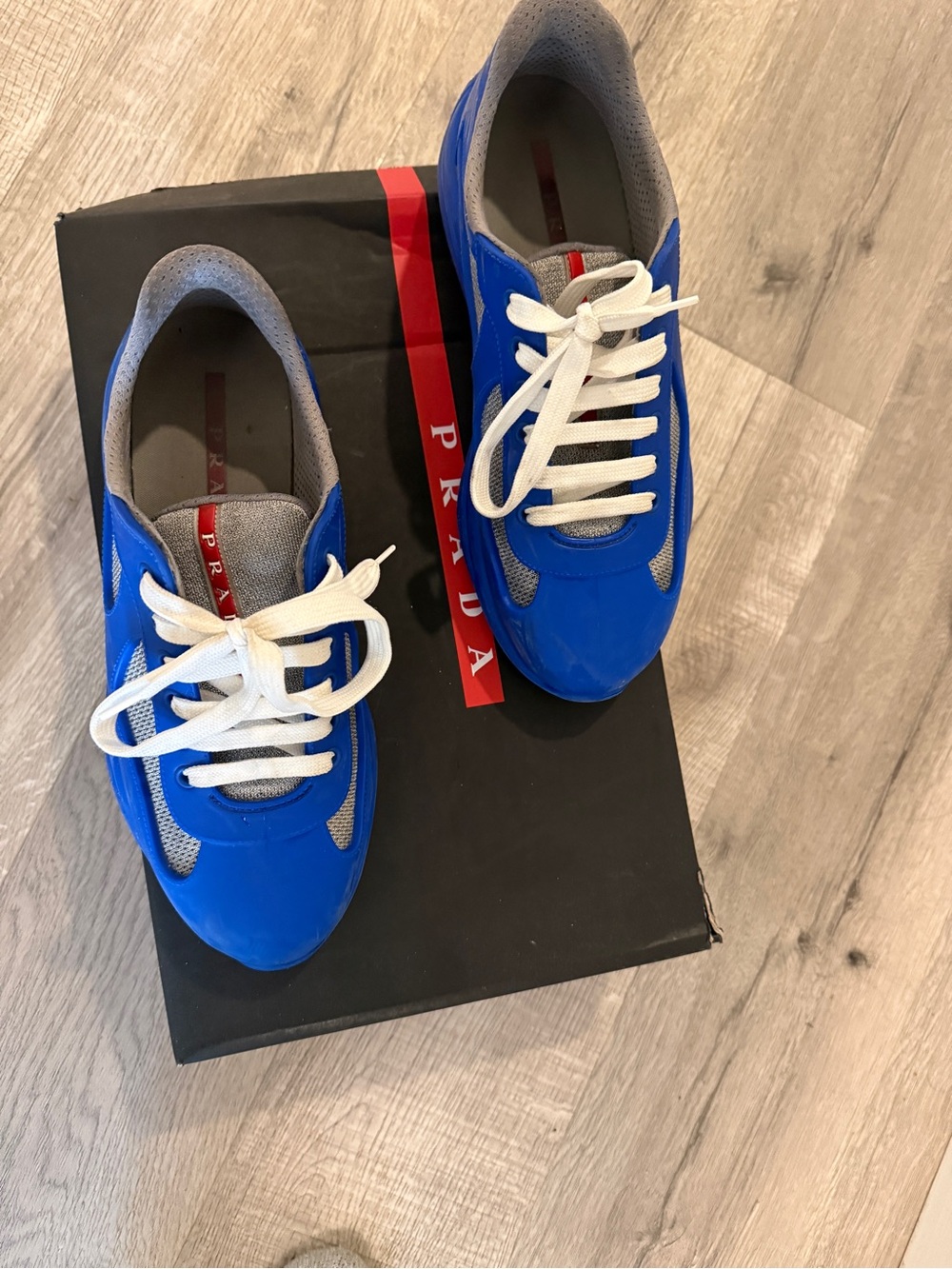 Men’s blue Prada Designer Sneakers with White Laces